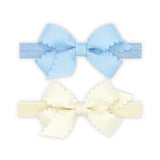 Two Mini Scallop Bows With Bands